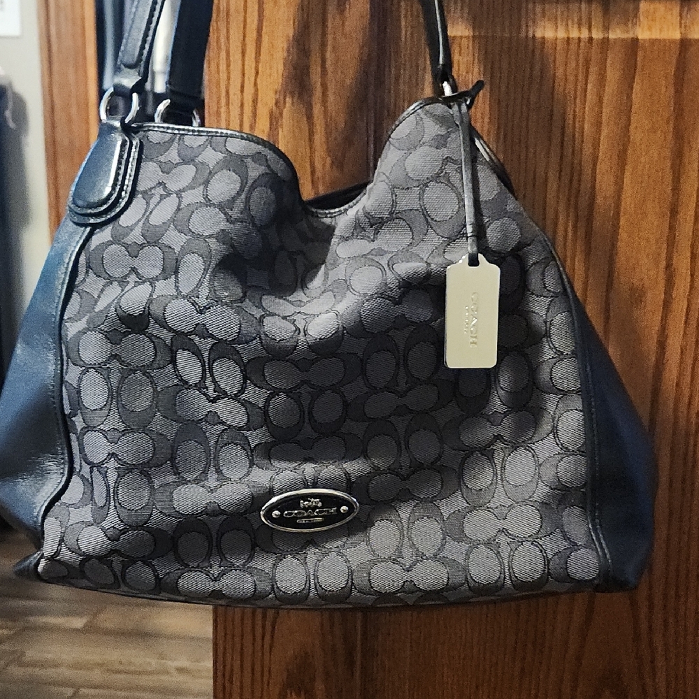 Coach Black Shoulder Bag with Monogram Pattern and Slouchy Hobo Style
